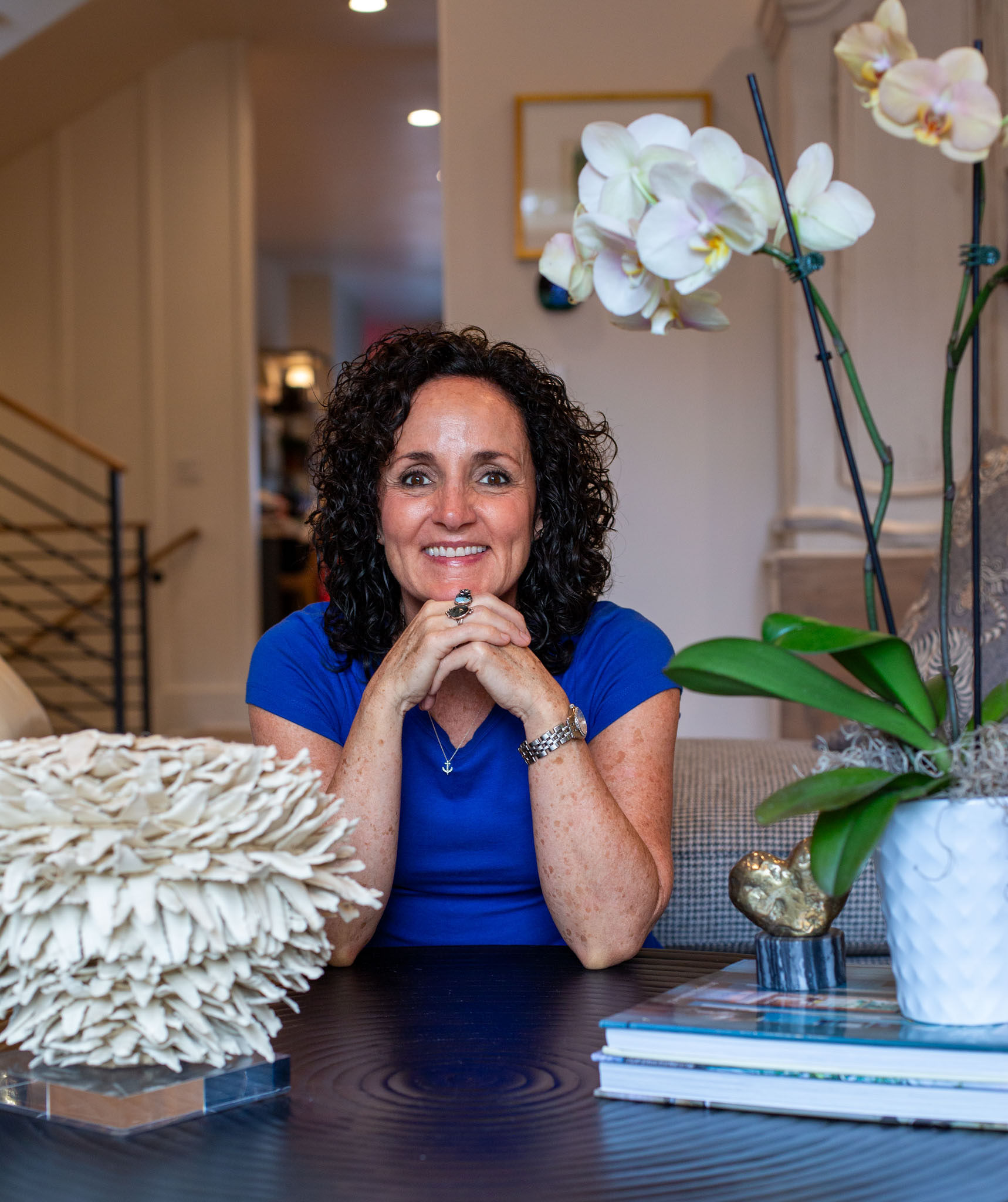 Julie James holistic health practitioner sitting and having a meaningful conversation with her client